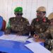 Ethiopian and Somali officers sign the transfer documents at the Buurhakaba base handover in Bay region