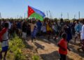 Supporters carry the Koonfur Bari flag at a mass gathering in Lower Shabelle, the administration now flying its flag over Marka
