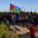 Supporters carry the Koonfur Bari flag at a mass gathering in Lower Shabelle, the administration now flying its flag over Marka