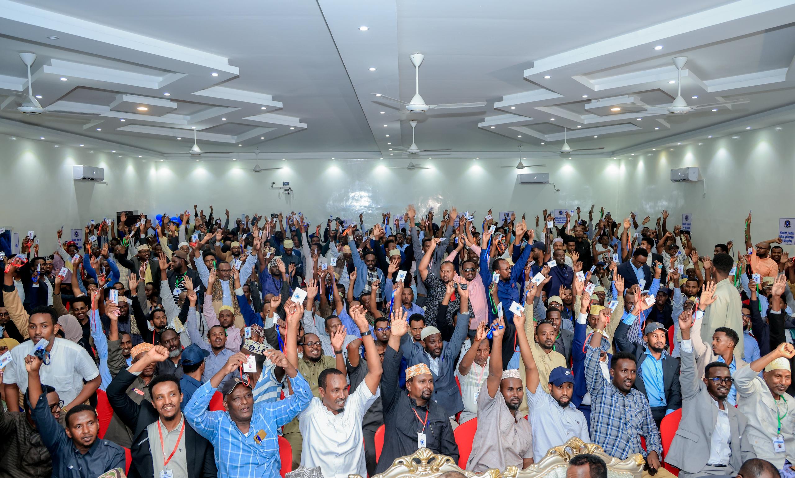 Delegates vote to adopt the North Eastern State constitution at Las Anod, the map behind the New Puntland campaign