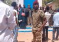 Residents and local officials protesting in Doolow in Gedo region after the strike on General Mahad Abdirahman, one demonstrator holding a placard bearing the Turkish flag