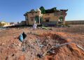 The wrecked compound in Doolow, its roof torn open and a crater in the yard, after the air strike of 4 September 2026